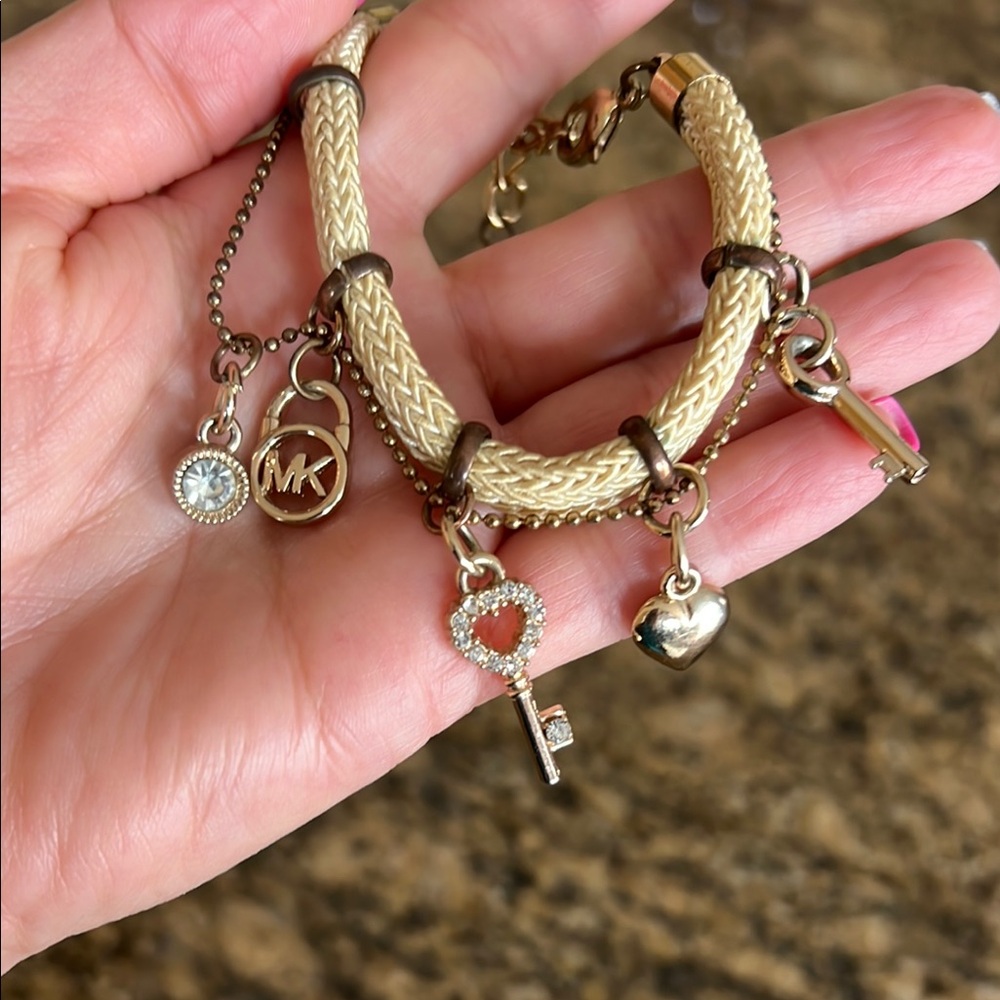 Michael Kors Gold Charm Bracelet with Elegant Design - Picture 4 of 6